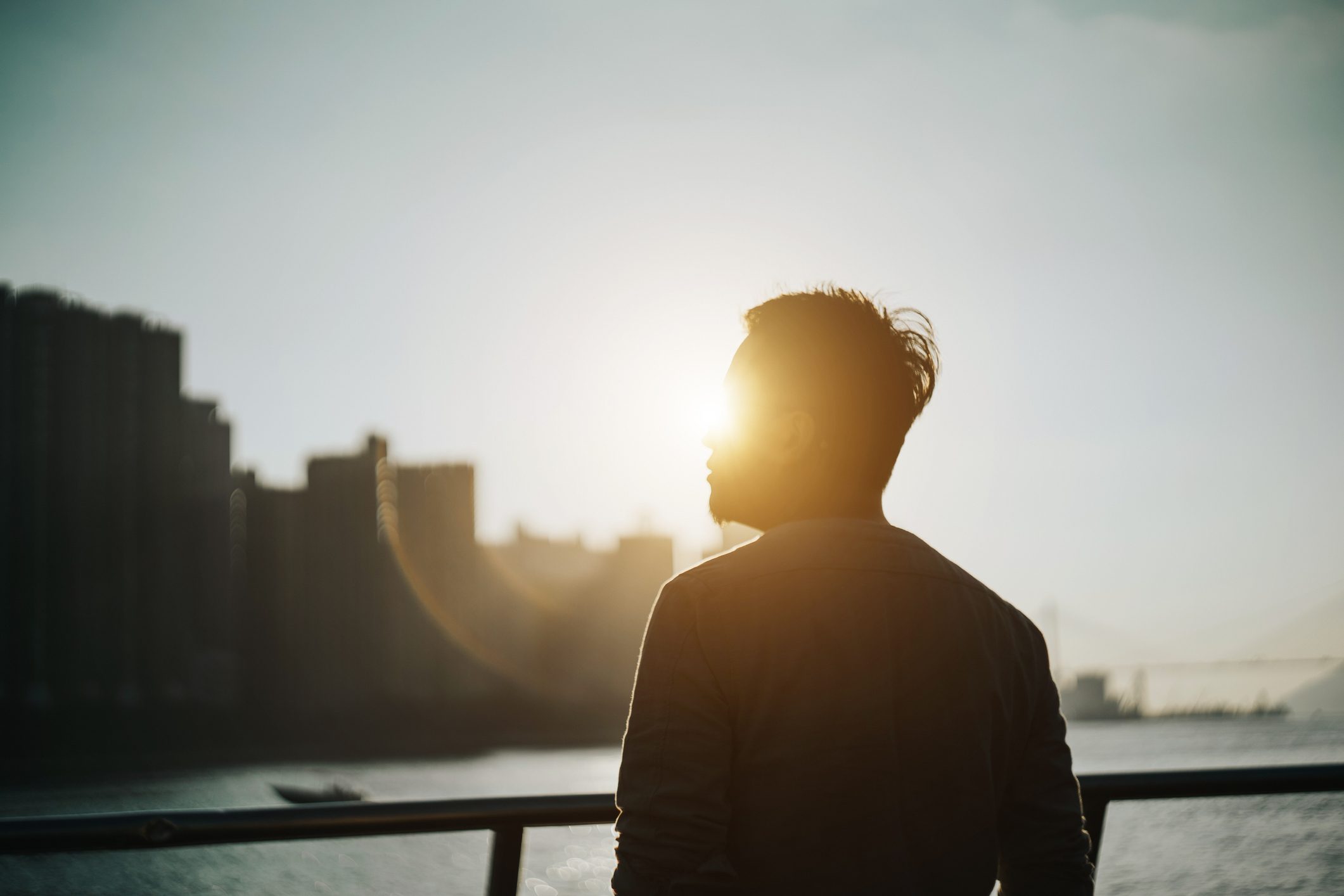 silhouette of a man outside during susnet