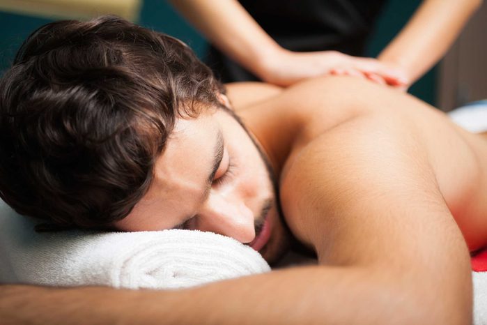 guy with beard getting a massage