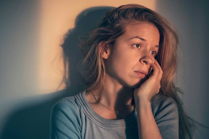 Young woman looking pensive