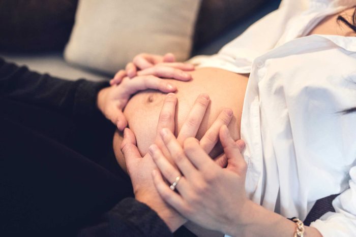 pregnant woman with bare belly