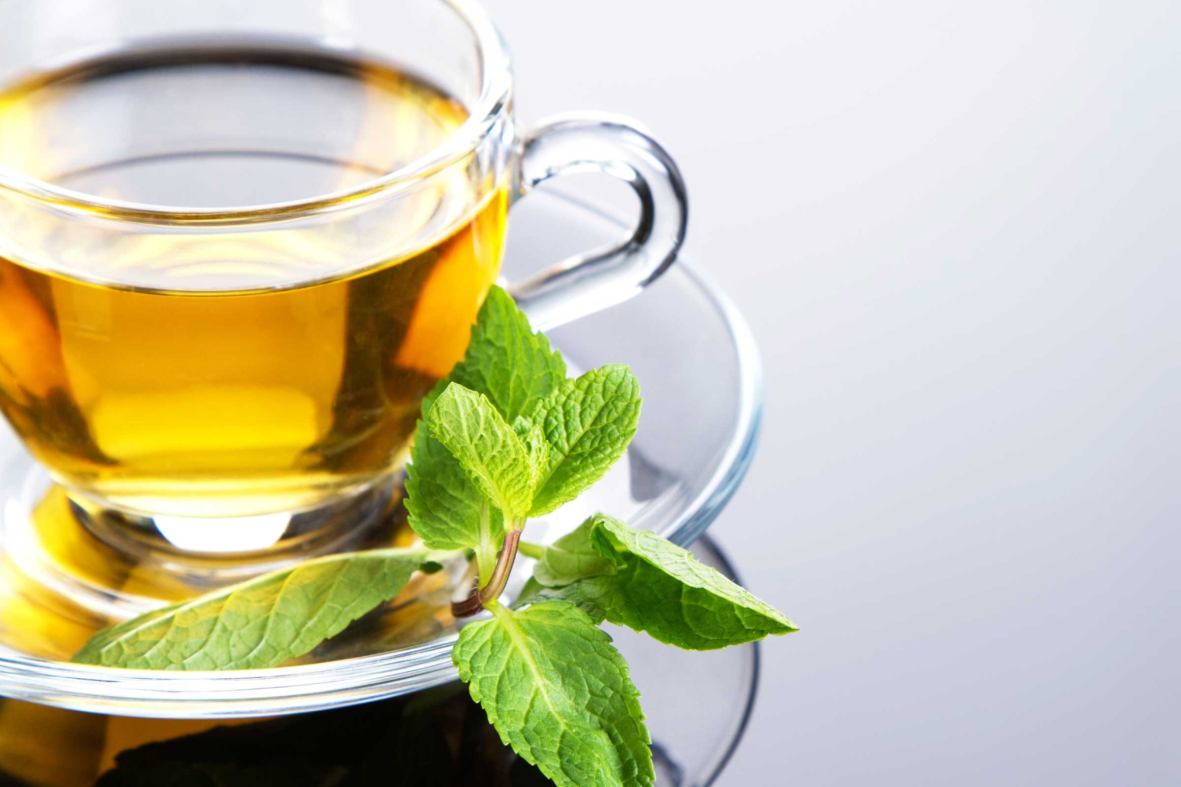 lovely cup of tea with mint on side