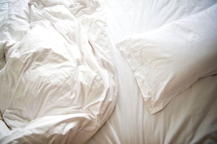 rumpled sheets on bed
