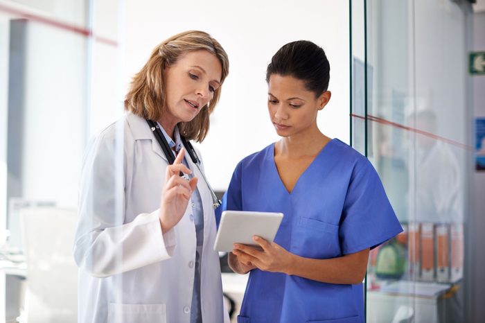 Healthcare workers looking at notes