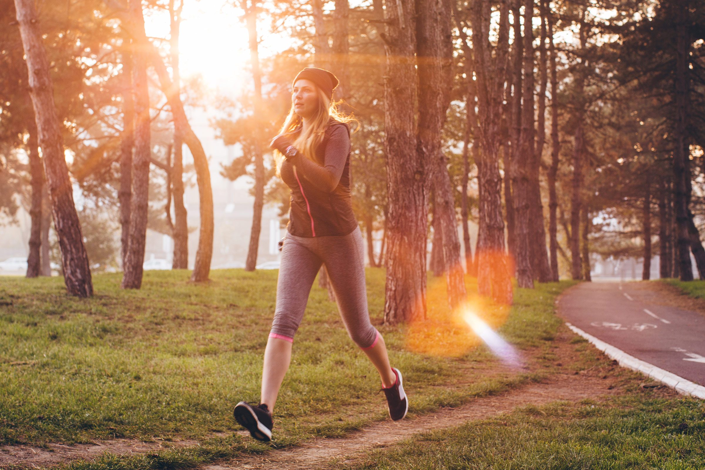 woman walking briskly outdoors