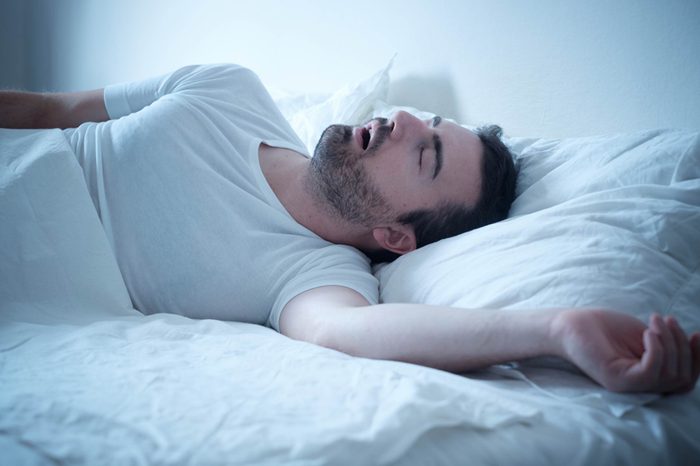 Mouth-breathing man in bed.