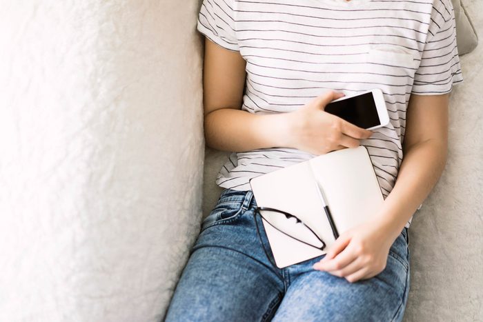 person reclining on a couch