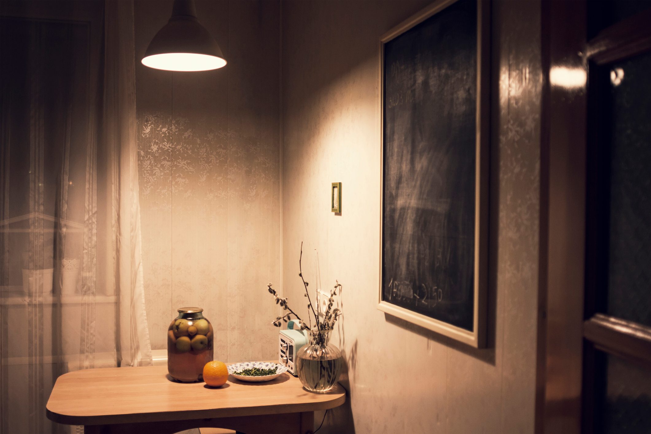 light over kitchen table shining at night