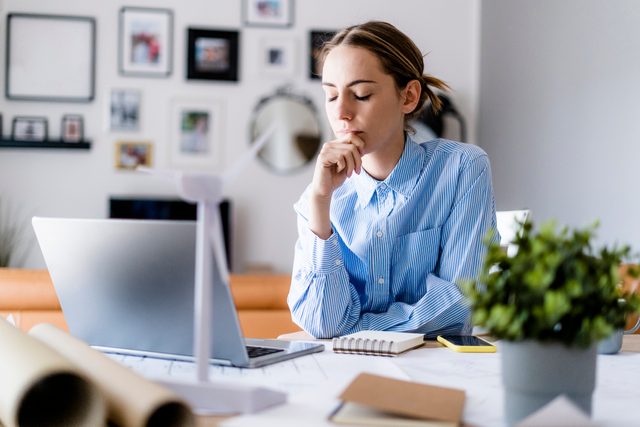 tired woman working from home