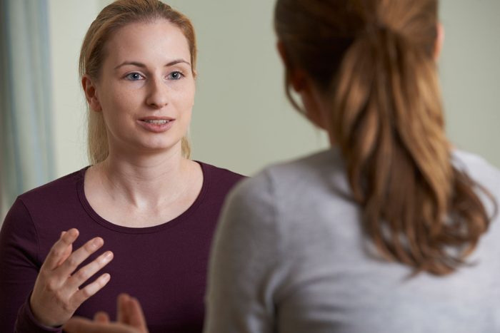 two women in conversation