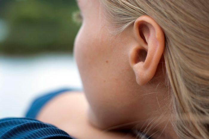 closeup of a woman's ear