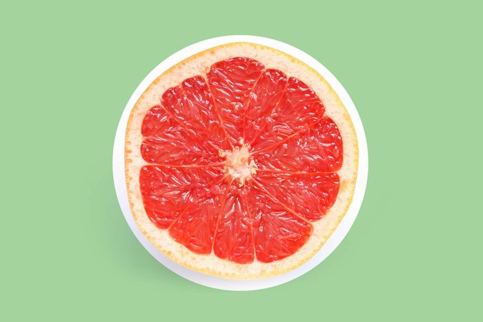 half of a ruby grapefruit