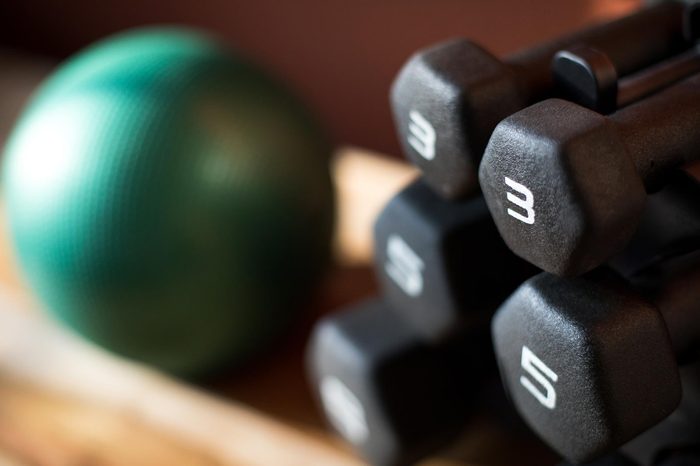 stack of weights next to medicine ball