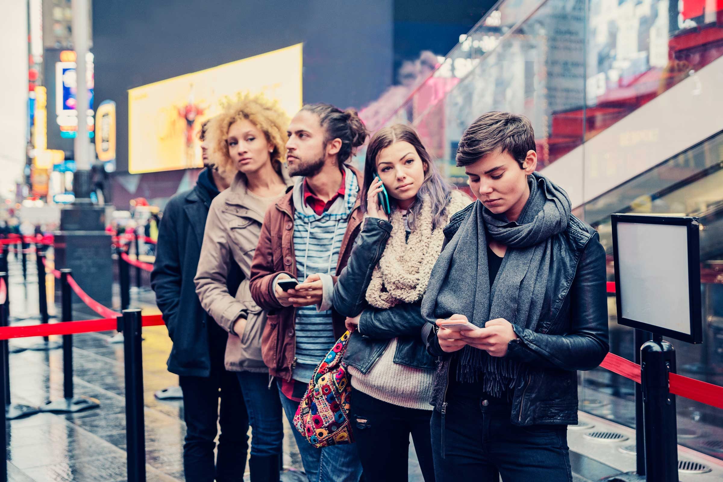 people standing in line outdoors