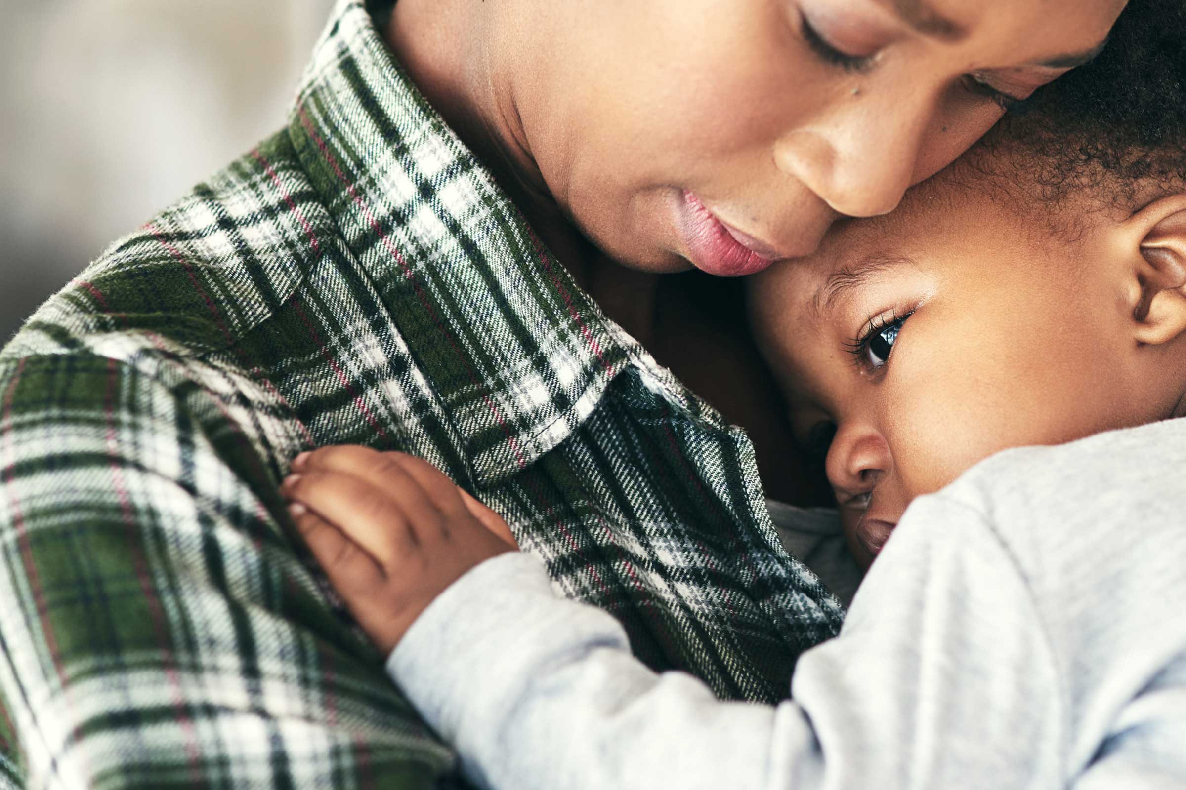 adult holding baby