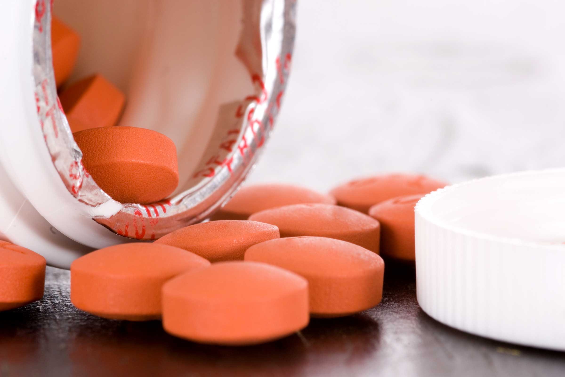 pills spilling out of a bottle