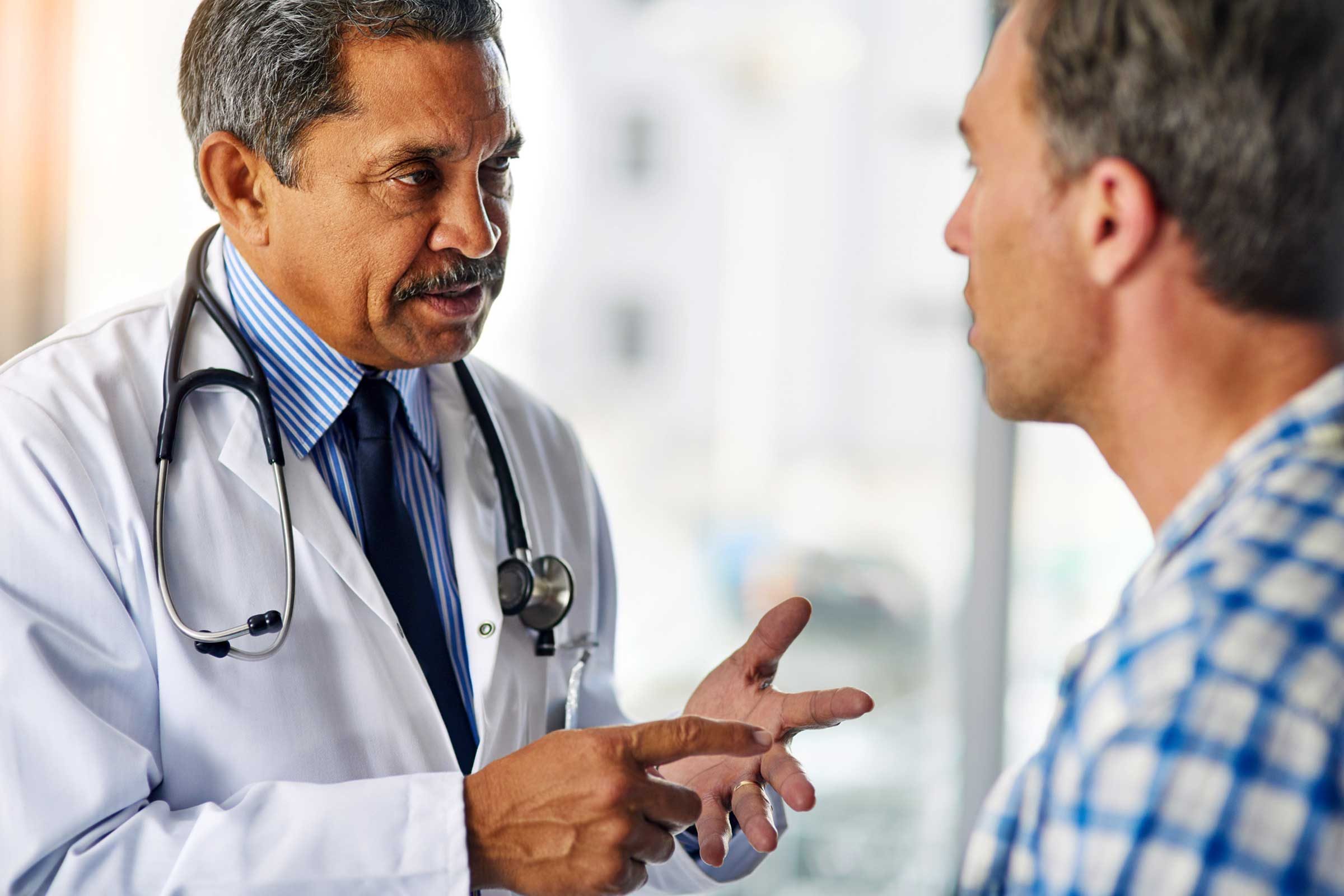 doctor giving advice to a patient