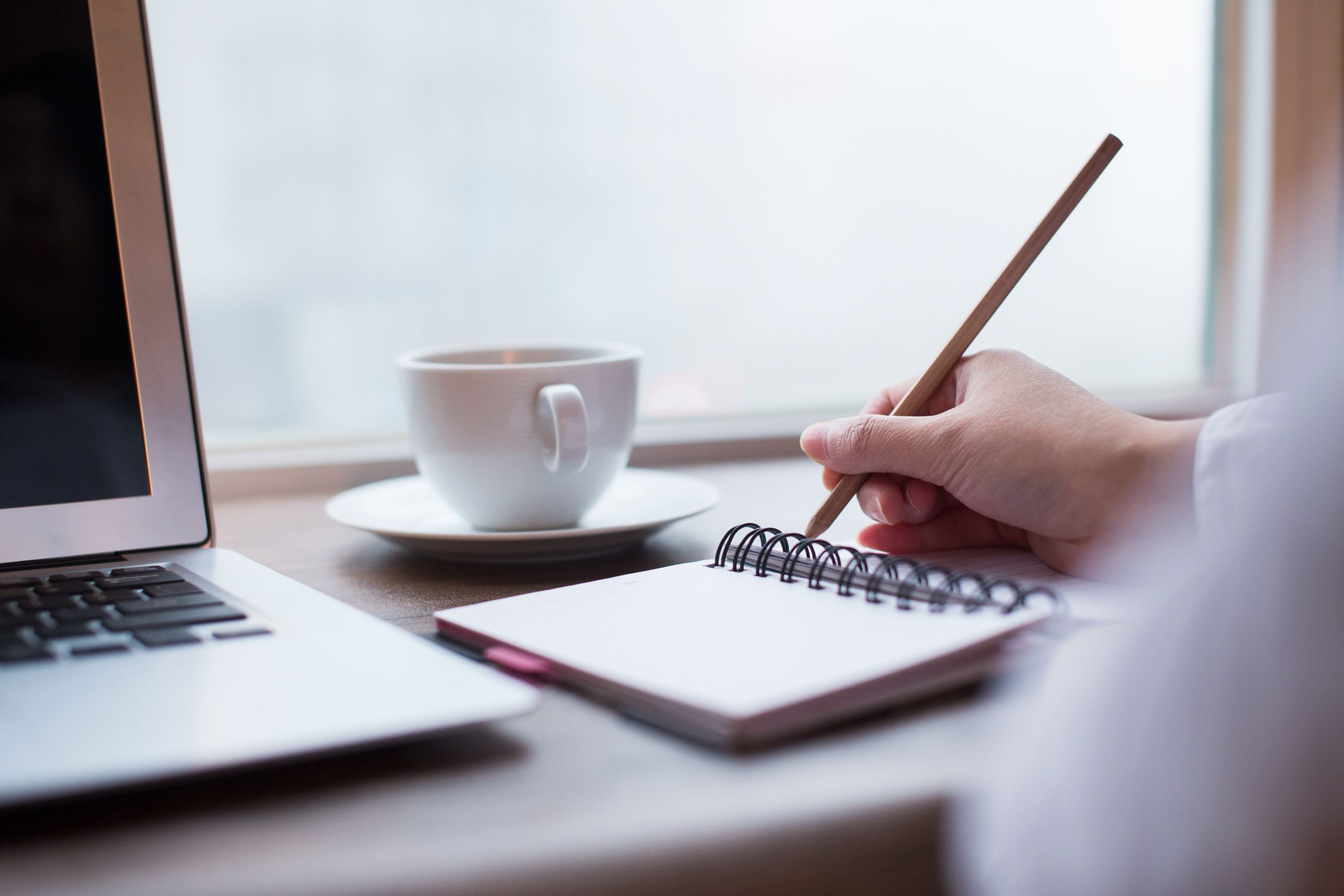 person writing a list