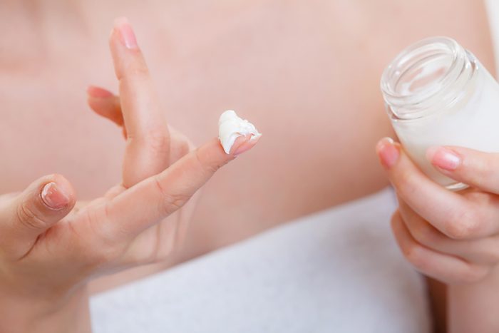 skin product on finger