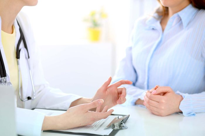 doctor talking with patient