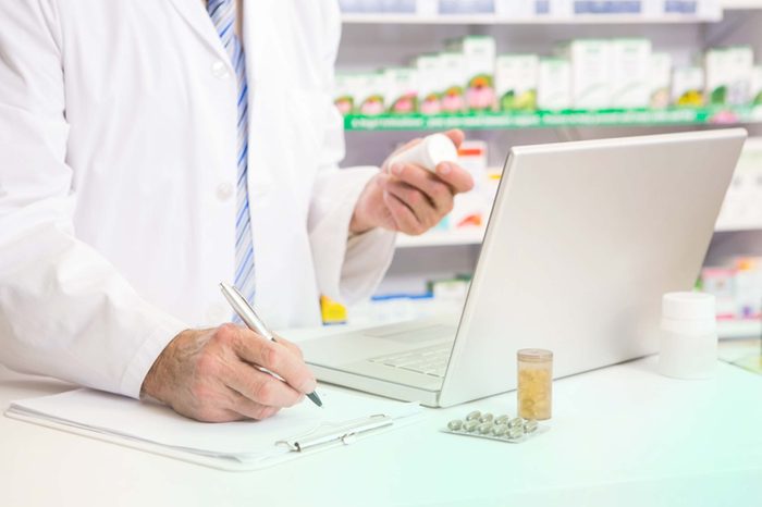 pharmacist at computer