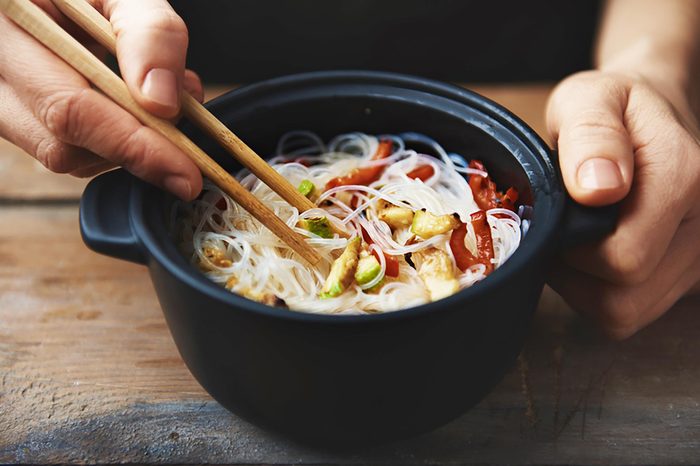 chopsticks and noodle bowl