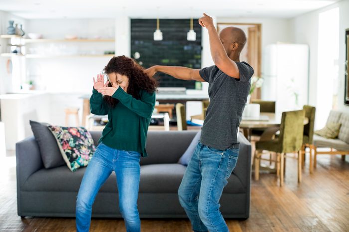 couple dancing at home