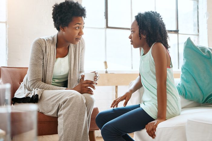 mother and daughter having conversation