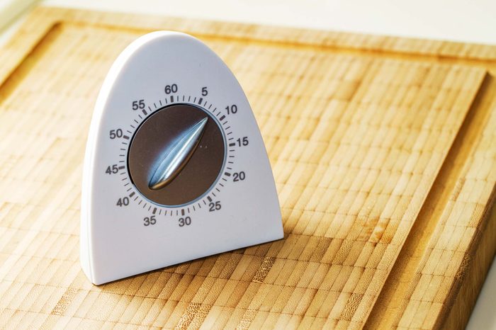 Timer sitting on cutting board