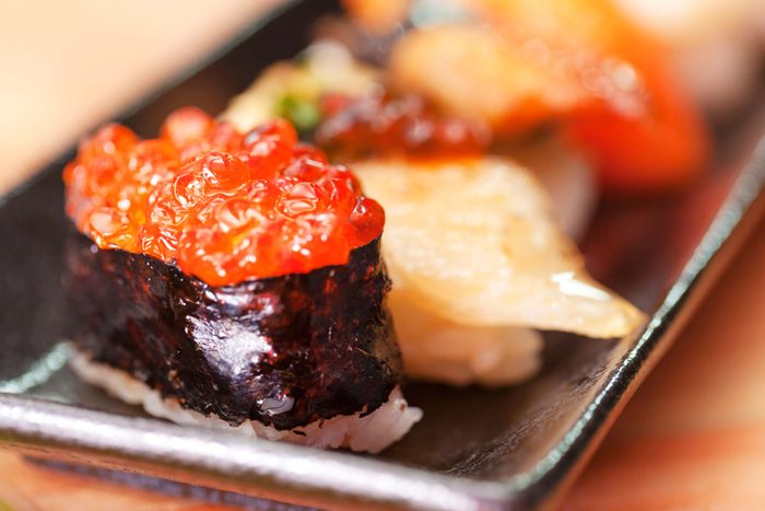 close up of sushi on a plate