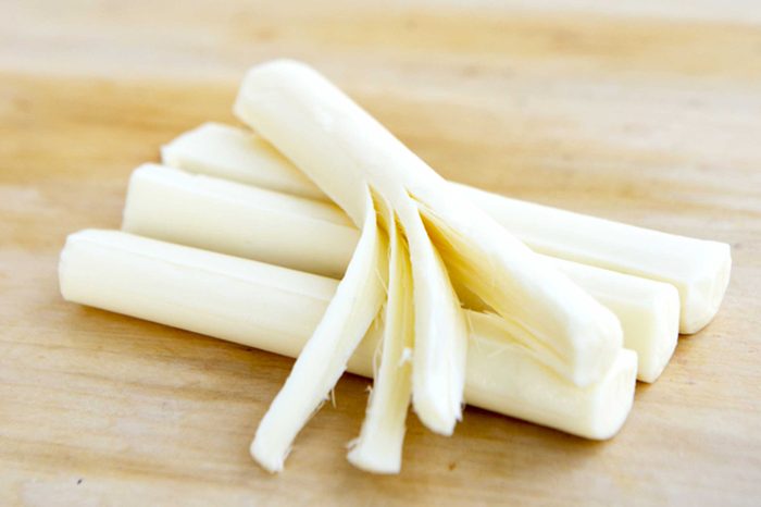 mozzarella cheese sticks on wood table