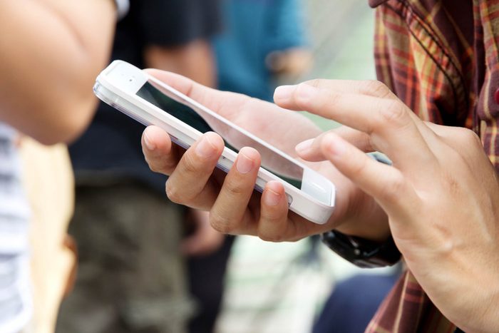 hands on cellphone