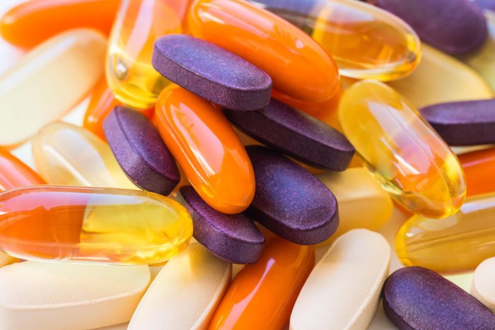 jumble of different colored vitamin pills