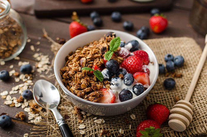 granola, blueberries, and strawberries over Greek yogurt