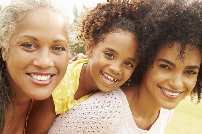Three generations of women: a grandmother, a mother, and a daughter.