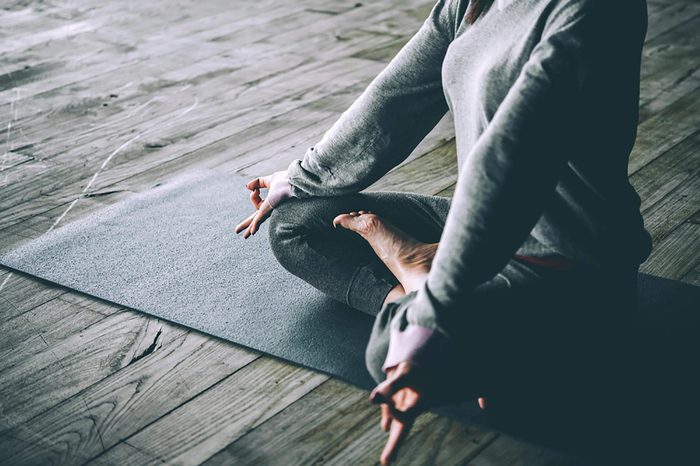 woman in a cross-legged meditative pose
