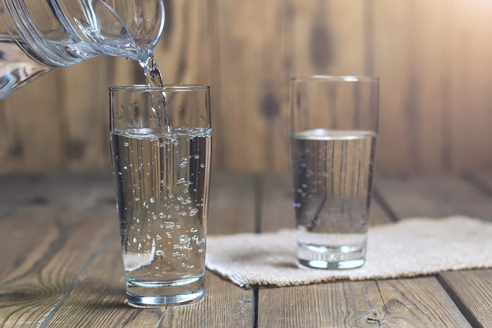 pouring glass of water