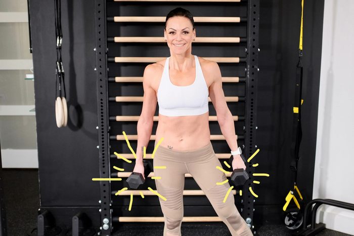 Woman with dumbbells.