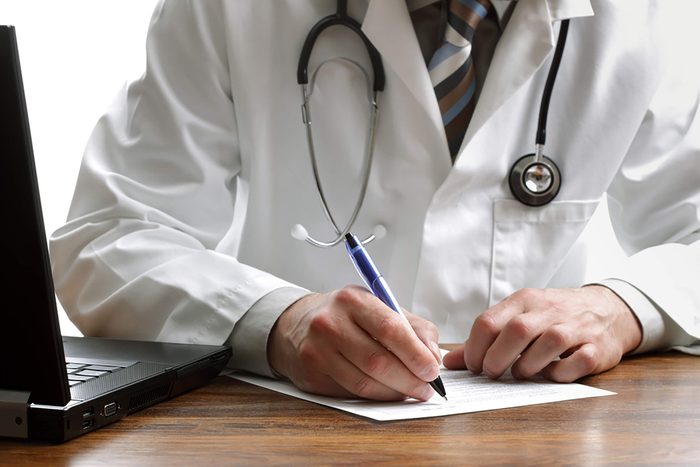 Doctor writing