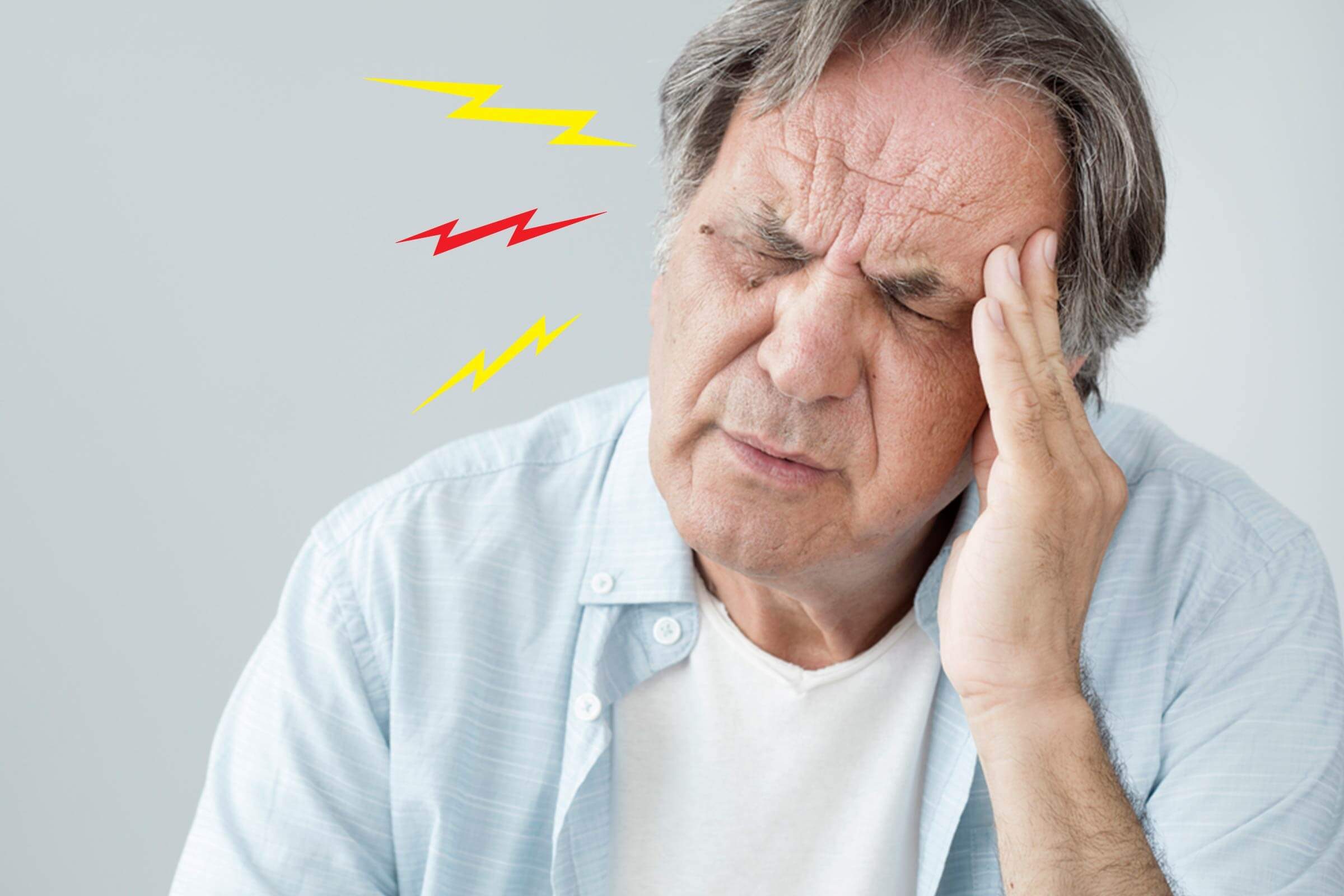 senior man with headache