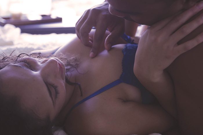 Man and woman in bed together.