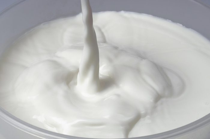 pour of milk into a glass