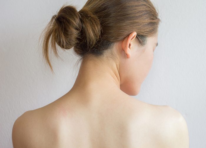 rear view of woman with hair in a bun
