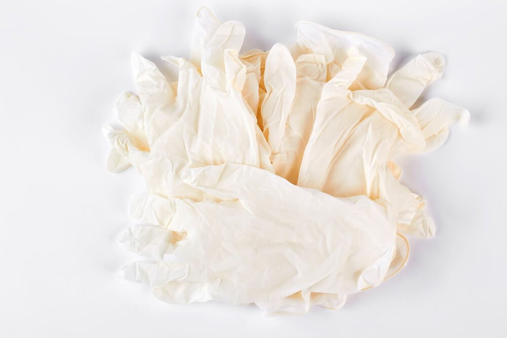 Pile of white medical gloves