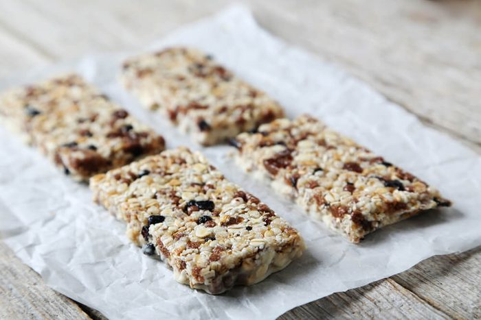 Granola bar on a grey wooden table