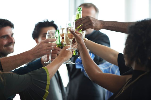 group of people drinking at an event
