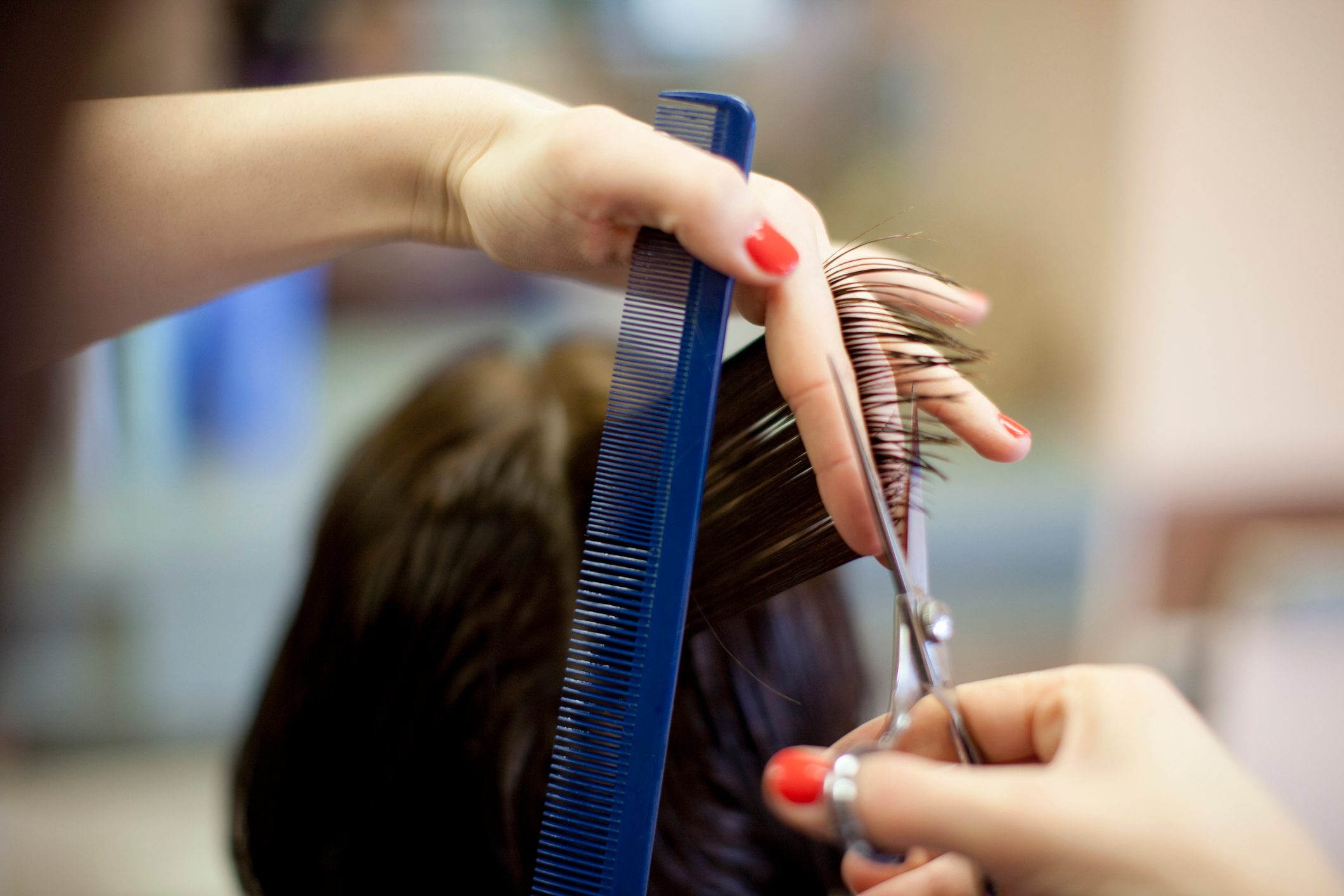 close up of cutting hair