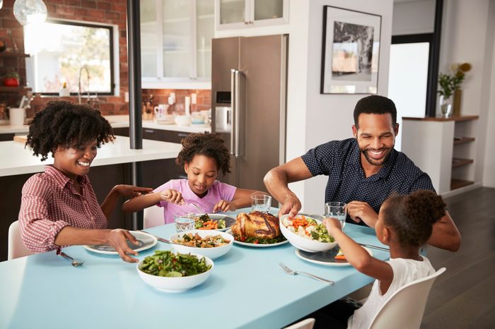 family enjoying a meal at home together