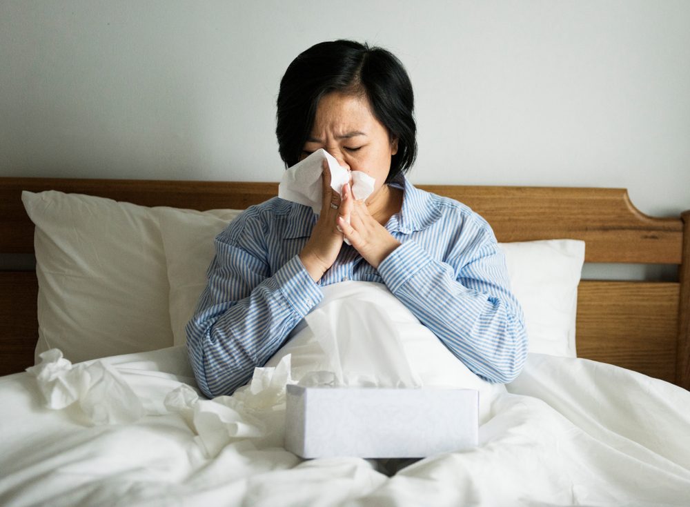 A woman suffering from cold