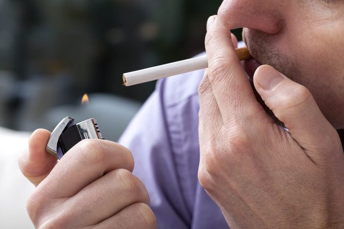 Lighting up a cigarette