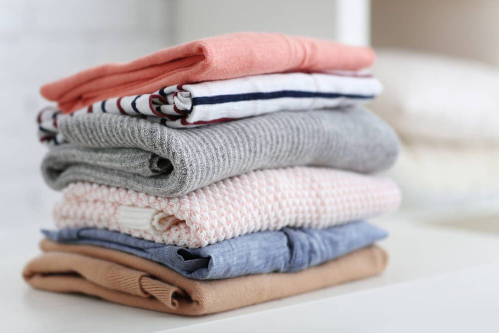 Pile of clothes on table